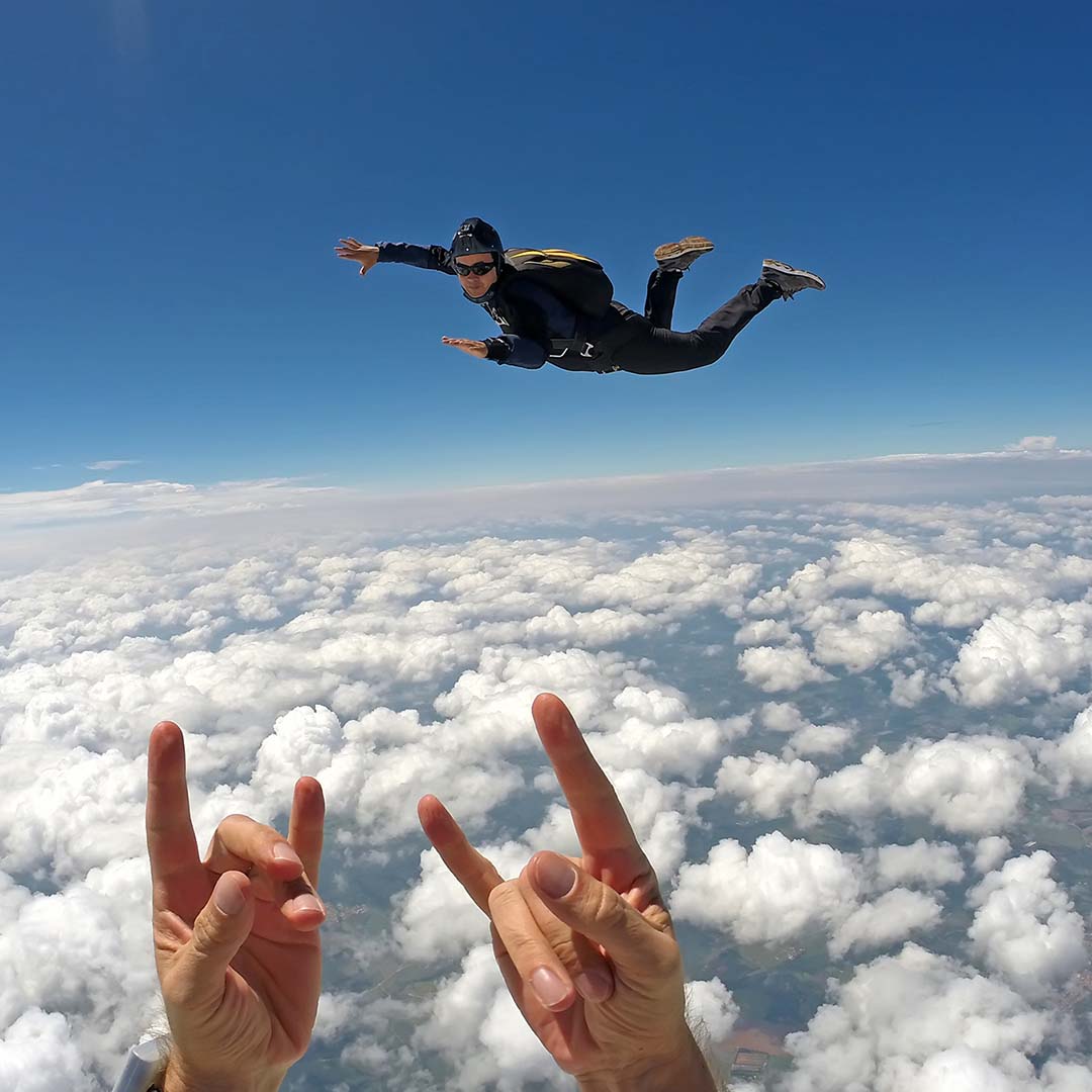 Two people skydiving and taking action in their lives.