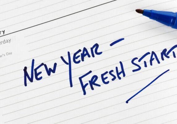 "new year fresh start" on a notepad