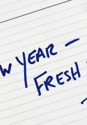 "new year fresh start" on a notepad